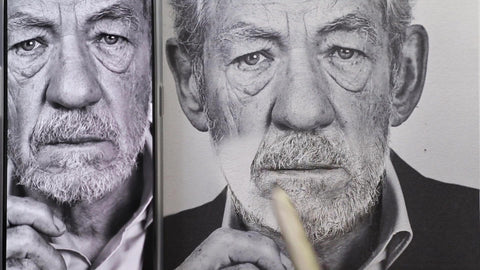 Clear finished drawing beside the reference photo — Karim Adel